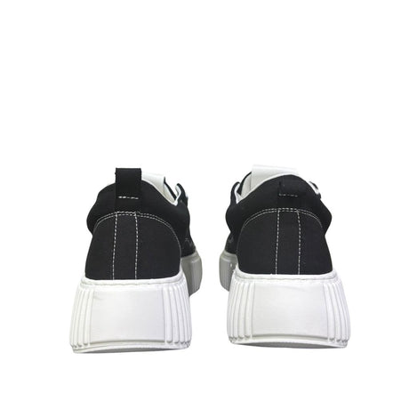 Sneaker uomo Unsolved tela nera cap toe bianco