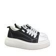 Sneaker uomo Unsolved tela nera cap toe bianco